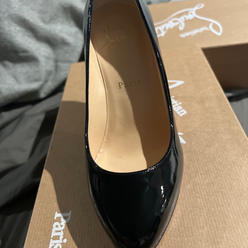Christian Loubiton black pumps